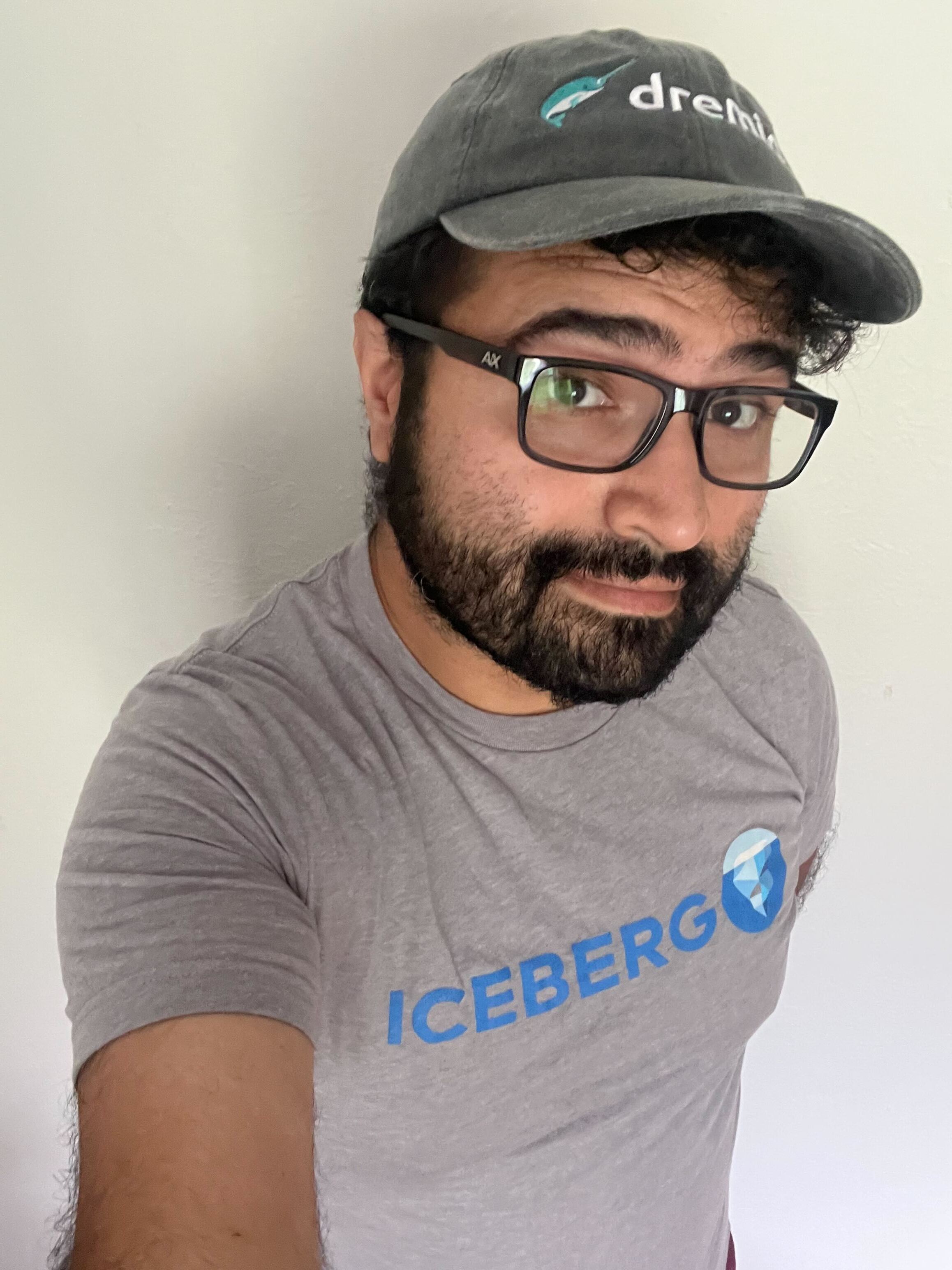 Alex Merced, Head of Developer Relations at Dremio, wearing a Dremio beanie